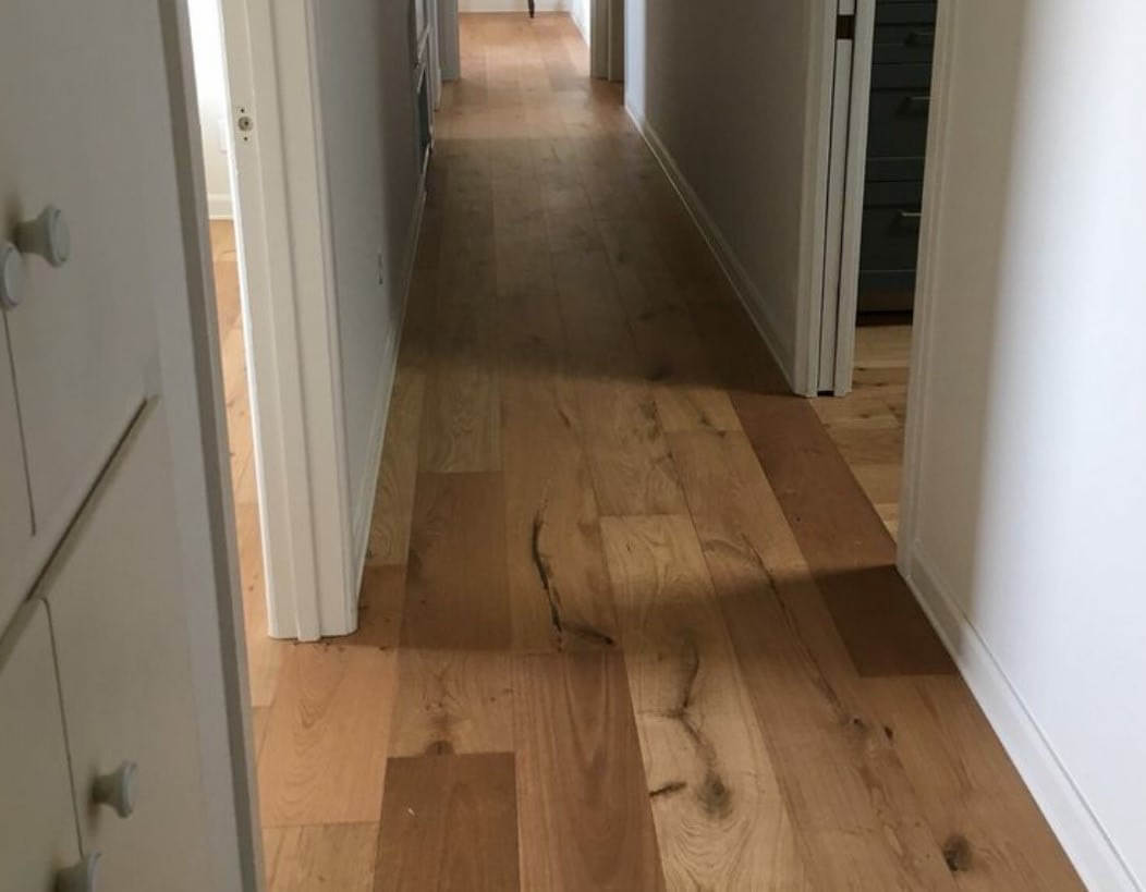 natural europeen oak floors in hallway installed in Plugerville, TX